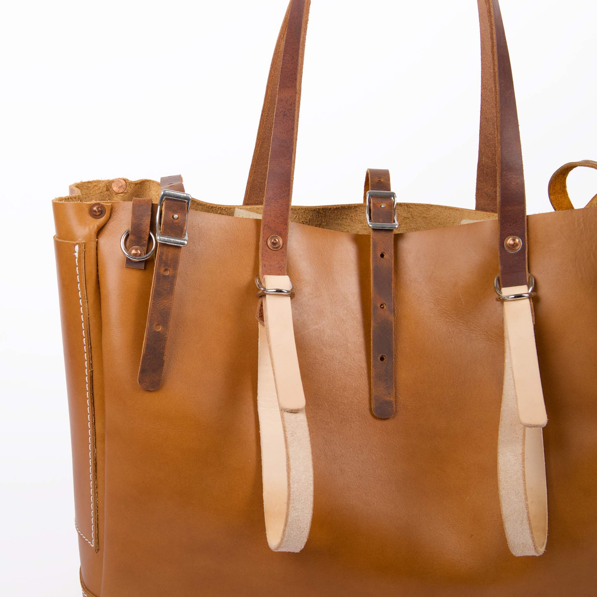 Vintner tote in cyclone by sonoma county leather buckle and strap detail