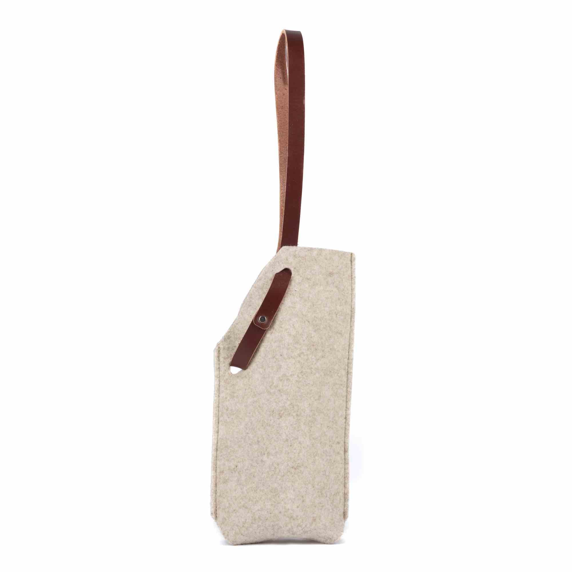 Single bottle felt wine sling by sonoma county leather in oatmeal long handle back