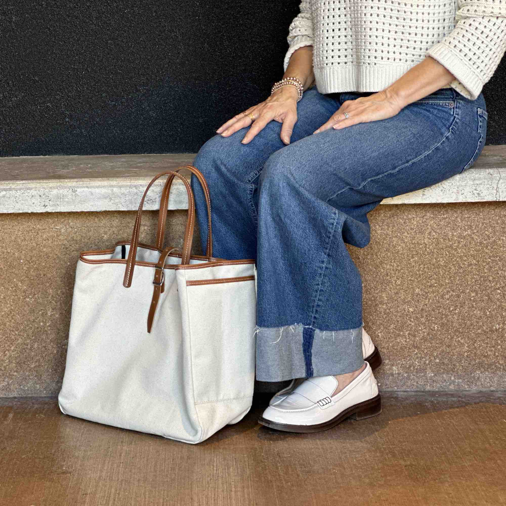 Day and night tote in natural canyon by sonoma county leather sitting lifestyle