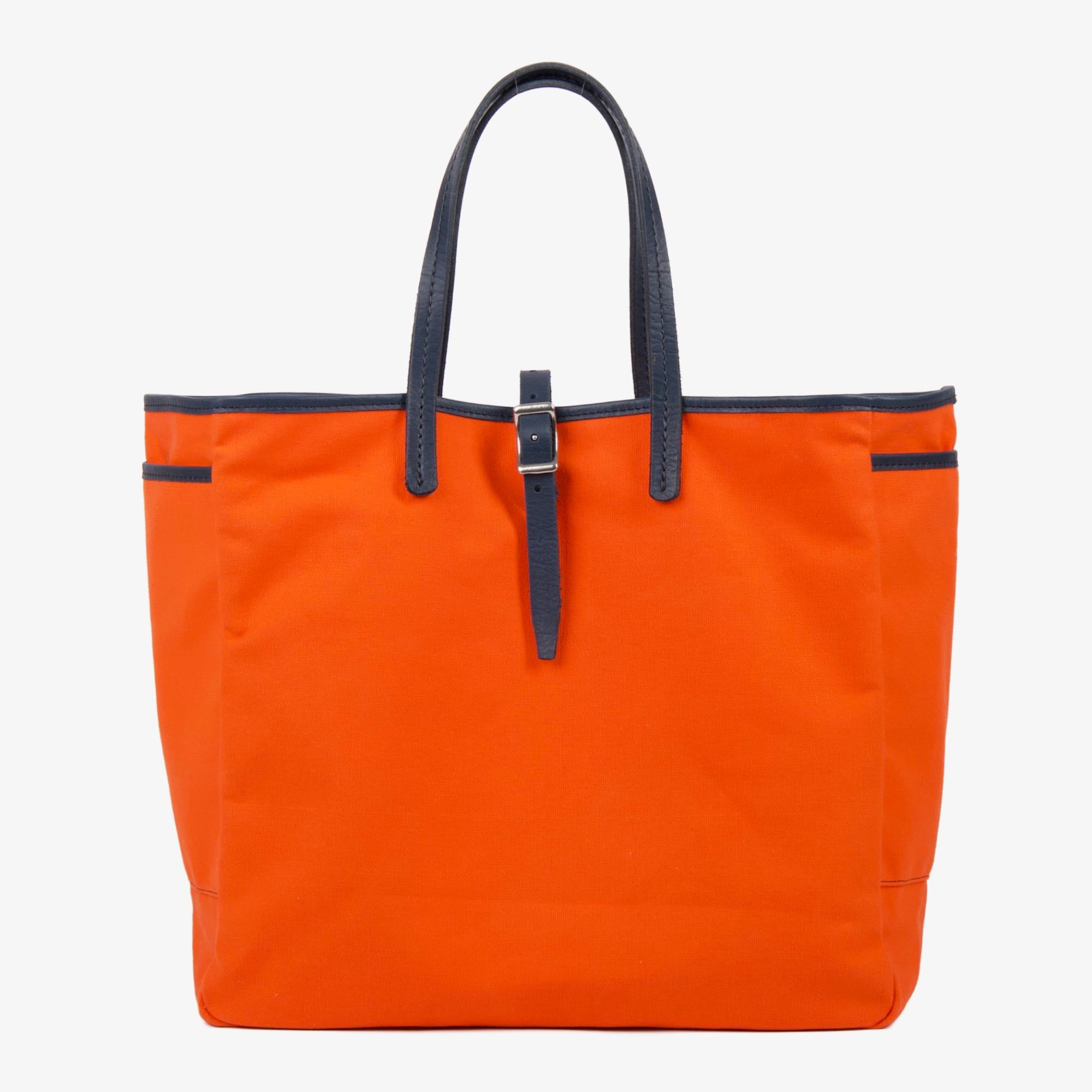 Day and night tote in orange navy by sonoma county leather front