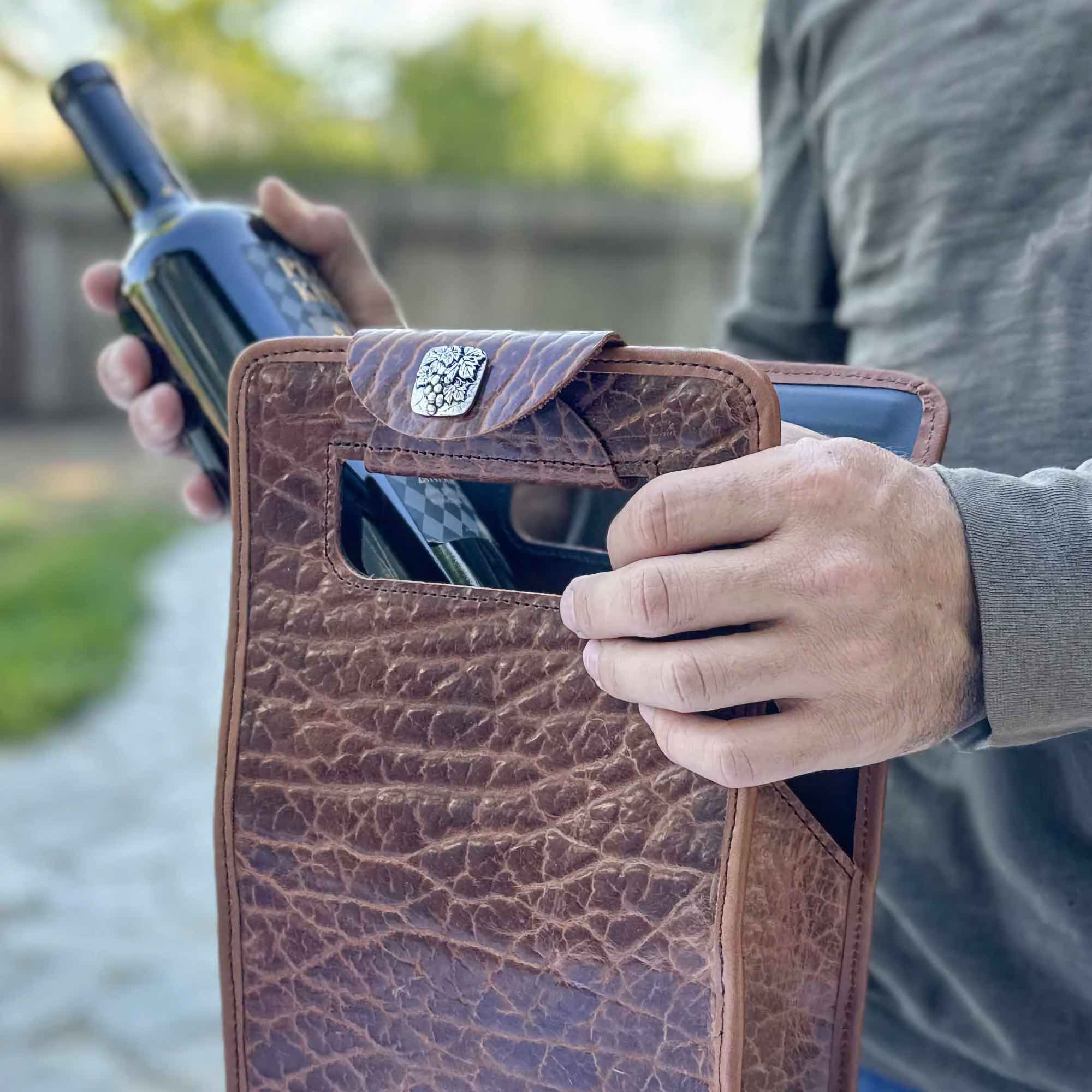 Bison Leather double wine bottle carrier bag, tobacco, with model and wine bottle