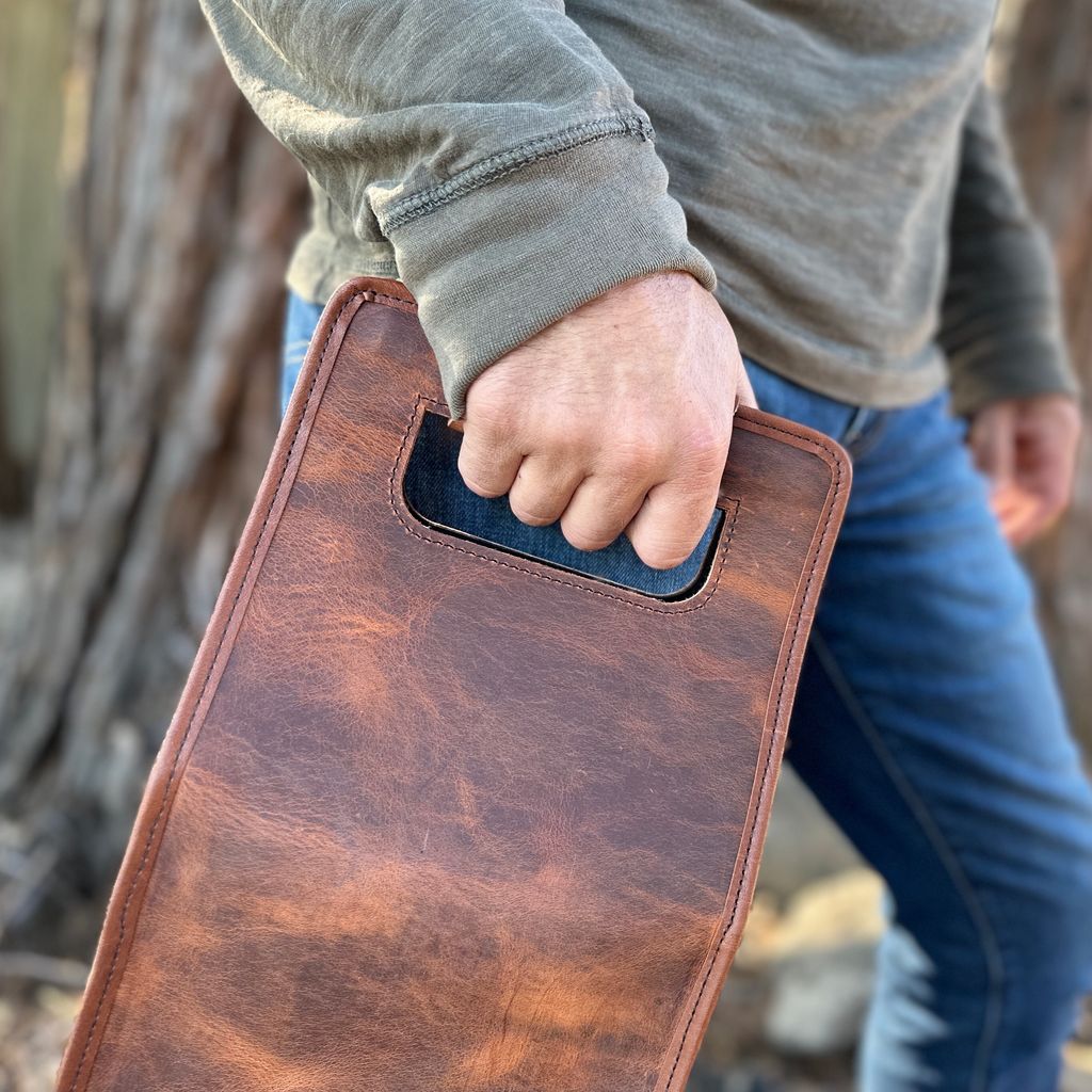 Double bottle wine carrier bag in good times by sonoma county leather hand holding detail